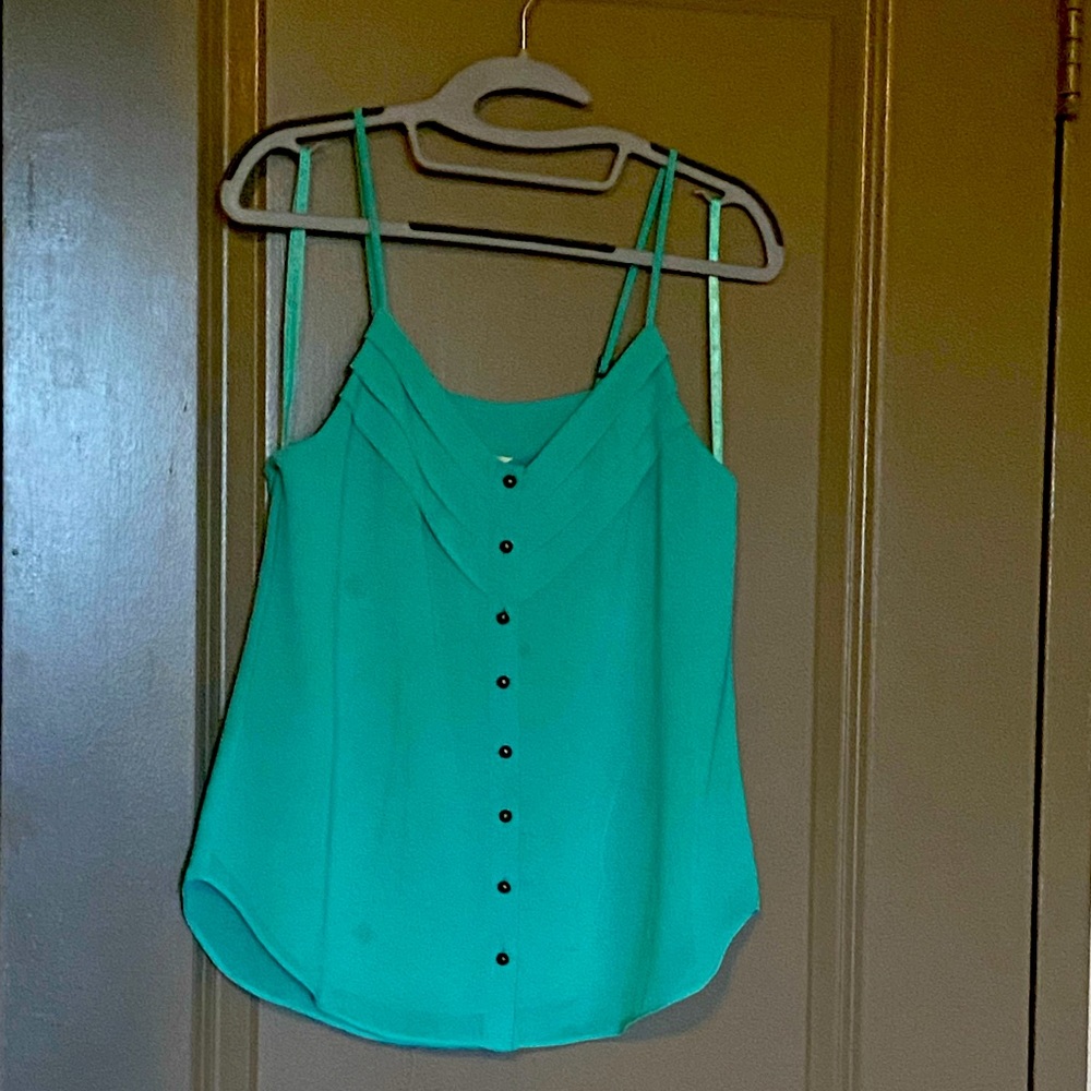 Flowy tank top, loose fitting, buttons down the front
